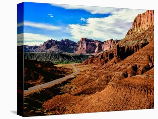 Road passing through rocky desert, Capitol Reef National Park, Utah, USA-null-Stretched Canvas