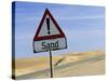 Road Sign Warning of Sand, Swamopmund, Namibia, Africa-Ann & Steve Toon-Stretched Canvas