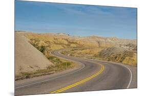 Road Swings Through the Badlands National Park, South Dakota, Usa-Michael Runkel-Mounted Premium Photographic Print