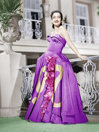 https://imgc.allpostersimages.com/img/posters/road-to-rio-dorothy-lamour-in-a-lavender-moire-taffeta-gown-by-howard-greer-1947_u-L-PJXVWR0.jpg?artPerspective=n