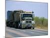 Road Train on the Stuart Highway, Northern Territory of Australia-Robert Francis-Mounted Photographic Print