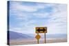 Road Warning Sign in Death Valley National Park-Paul Souders-Stretched Canvas