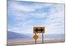 Road Warning Sign in Death Valley National Park-Paul Souders-Mounted Photographic Print