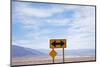 Road Warning Sign in Death Valley National Park-Paul Souders-Mounted Photographic Print