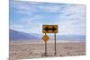 Road Warning Sign in Death Valley National Park-Paul Souders-Mounted Photographic Print