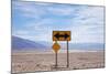 Road Warning Sign in Death Valley National Park-Paul Souders-Mounted Photographic Print