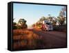 Roadtrain Hurtles Through Outback, Cape York Peninsula, Queensland, Australia-Oliver Strewe-Framed Stretched Canvas