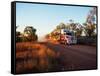Roadtrain Hurtles Through Outback, Cape York Peninsula, Queensland, Australia-Oliver Strewe-Framed Stretched Canvas