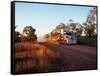 Roadtrain Hurtles Through Outback, Cape York Peninsula, Queensland, Australia-Oliver Strewe-Framed Stretched Canvas