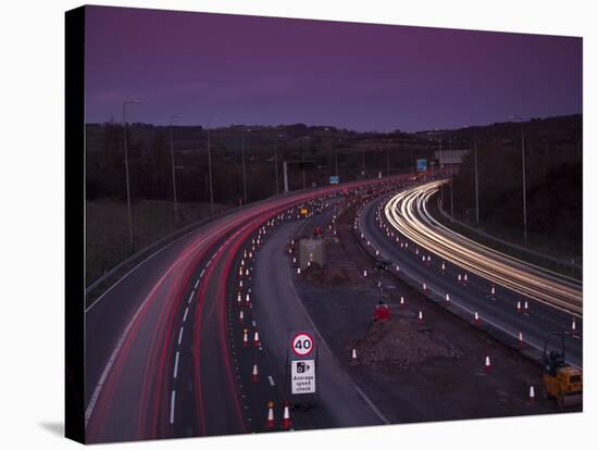 Roadworks, Lane Closures and Speed Limits on M5 Motorway at Dusk, Near Birmingham, England-Ian Egner-Stretched Canvas