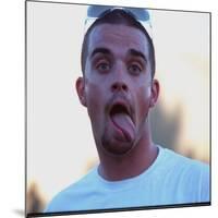 Robbie Williams Sticking His Tongue Out to Photographers at T in the Park Festival-null-Mounted Photographic Print