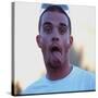 Robbie Williams Sticking His Tongue Out to Photographers at T in the Park Festival-null-Stretched Canvas