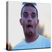 Robbie Williams Sticking His Tongue Out to Photographers at T in the Park Festival-null-Stretched Canvas