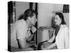 Robert and Dorothy Mitchum, 1952 Robert Mitchum with his wife Dorothy 1952 (b/w photo)-null-Stretched Canvas