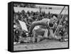 Robert B. Mathias Grimacing with the Effort of His 22 Foot 11 Inch Leap at 1952 Olympics-Mark Kauffman-Framed Stretched Canvas