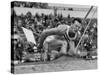 Robert B. Mathias Grimacing with the Effort of His 22 Foot 11 Inch Leap at 1952 Olympics-Mark Kauffman-Stretched Canvas