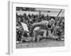 Robert B. Mathias Grimacing with the Effort of His 22 Foot 11 Inch Leap at 1952 Olympics-Mark Kauffman-Framed Premium Photographic Print