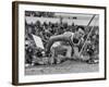 Robert B. Mathias Grimacing with the Effort of His 22 Foot 11 Inch Leap at 1952 Olympics-Mark Kauffman-Framed Premium Photographic Print