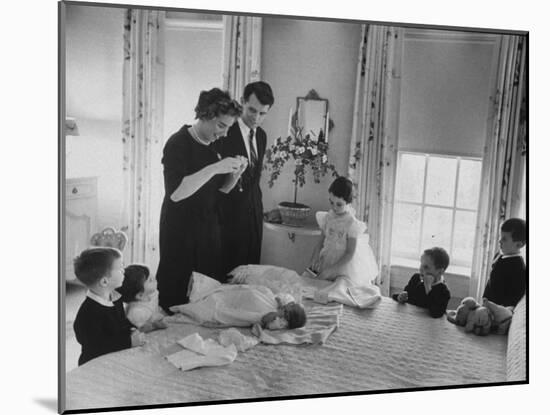 Robert F. Kennedy and His Wife Preparing Son Michael, for Baptism-Ed Clark-Mounted Photographic Print