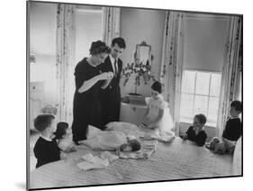 Robert F. Kennedy and His Wife Preparing Son Michael, for Baptism-Ed Clark-Mounted Photographic Print