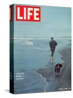 Robert F. Kennedy Jogging on the Beach with his Dog, June 14, 1968-Bill Eppridge-Stretched Canvas