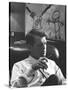 Robert F. Kennedy Sitting in Office in Front of Child's Painting-null-Stretched Canvas