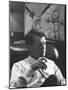 Robert F. Kennedy Sitting in Office in Front of Child's Painting-null-Mounted Photographic Print