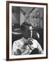 Robert F. Kennedy Sitting in Office in Front of Child's Painting-null-Framed Photographic Print