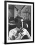 Robert F. Kennedy Sitting in Office in Front of Child's Painting-null-Framed Photographic Print