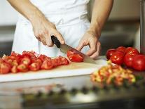 Chef Chopping Tomatoes-Robert Kneschke-Laminated Photographic Print