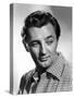 ROBERT MITCHUM (1917- 1997) en, 1948 (b/w photo)-null-Stretched Canvas