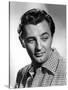 ROBERT MITCHUM (1917- 1997) en, 1948 (b/w photo)-null-Stretched Canvas