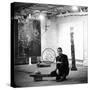 Robert Rauschenberg Sitting on His Sculpture in Studio, Among Other Paintings and Sculptures-Allan Grant-Stretched Canvas