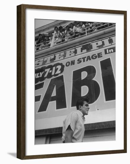 Rock and Roll Singer Fabian Walking Beneath Balcony filled with fans-Alfred Eisenstaedt-Framed Premium Photographic Print