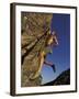 Rock Climber Hanging from Grip-null-Framed Photographic Print