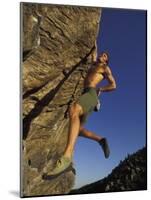 Rock Climber Hanging from Grip-null-Mounted Photographic Print