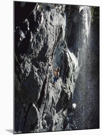 Rock Climber Near a Waterfall-null-Mounted Photographic Print