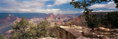 https://imgc.allpostersimages.com/img/posters/rock-formations-in-a-national-park-mather-point-grand-canyon-national-park-arizona-usa_u-L-P323RM0.jpg?artPerspective=n