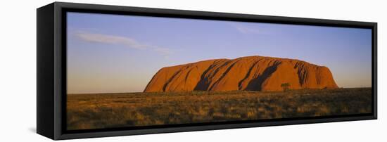 Rock Formations on a Landscape, Ayers Rock, Uluru-Kata Tjuta National Park, Northern Territory-null-Framed Stretched Canvas