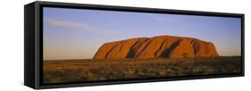 Rock Formations on a Landscape, Ayers Rock, Uluru-Kata Tjuta National Park, Northern Territory-null-Framed Stretched Canvas