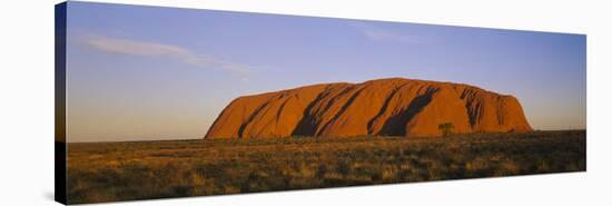 Rock Formations on a Landscape, Ayers Rock, Uluru-Kata Tjuta National Park, Northern Territory-null-Stretched Canvas