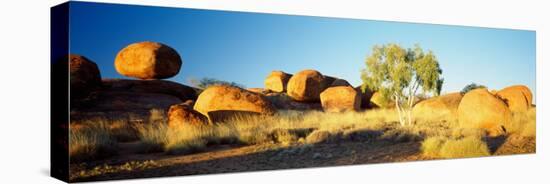 Rock Formations on a Landscape, Devil's Marbles, Northern Territory, Australia-null-Stretched Canvas