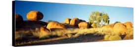 Rock Formations on a Landscape, Devil's Marbles, Northern Territory, Australia-null-Stretched Canvas