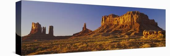 Rock Formations on a Landscape, Monument Valley, Monument Valley Tribal Park, Utah, USA-null-Stretched Canvas