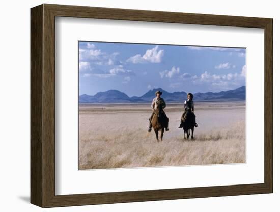 Rock Hudson and Elizabeth Taylor Ride Horses During the Filming of 'Giant', Marfa, Texas, 1956-Allan Grant-Framed Photographic Print