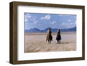 Rock Hudson and Elizabeth Taylor Ride Horses During the Filming of 'Giant', Marfa, Texas, 1956-Allan Grant-Framed Photographic Print