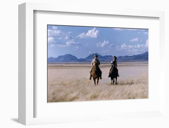Rock Hudson and Elizabeth Taylor Ride Horses During the Filming of 'Giant', Marfa, Texas, 1956-Allan Grant-Framed Photographic Print