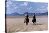 Rock Hudson and Elizabeth Taylor Ride Horses During the Filming of 'Giant', Marfa, Texas, 1956-Allan Grant-Stretched Canvas