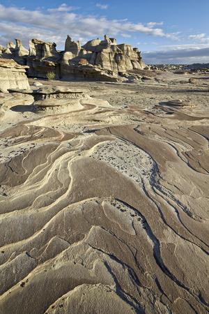 https://imgc.allpostersimages.com/img/posters/rock-layers-in-the-badlands-bisti-wilderness-new-mexico-united-states-of-america-north-america_u-L-PSY19P0.jpg?artPerspective=n