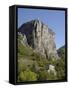 Rock of Castellane Towering Above a Small House-Chris Hellier-Framed Stretched Canvas